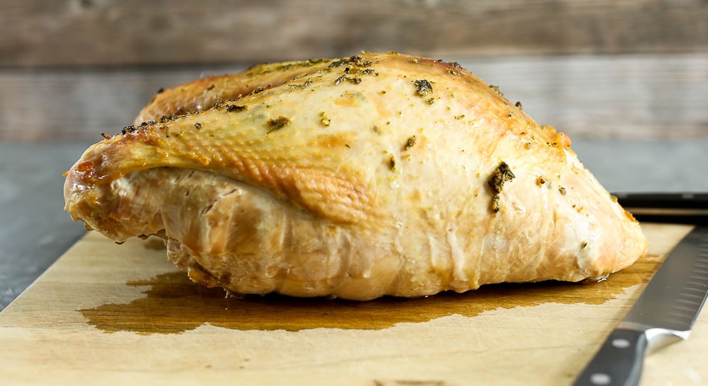 Roasted Turkey Breast Recipe the whole breast on a cutting board