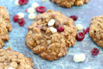 Cranberry White Chocolate Chip Oatmeal Cookies Recipe close up of one big cookie