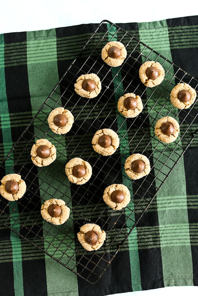 Gluten Free Peanut Butter Blossoms Cookies on a cooling rack