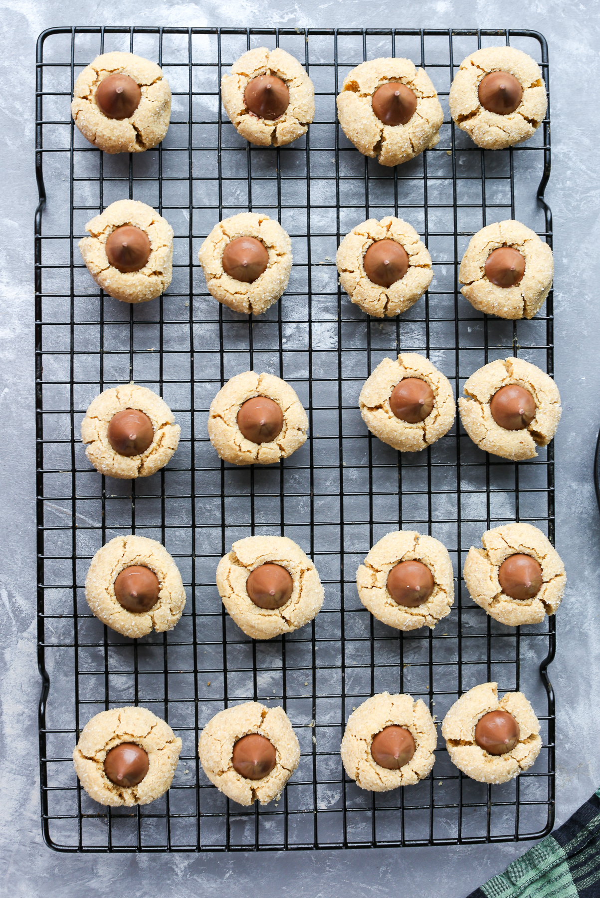gluten free peanut butter blossoms on a wire rack