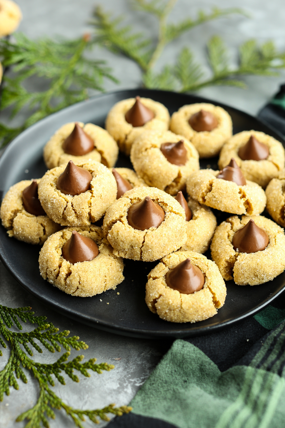 a plate of gluten free peanut butter blossoms