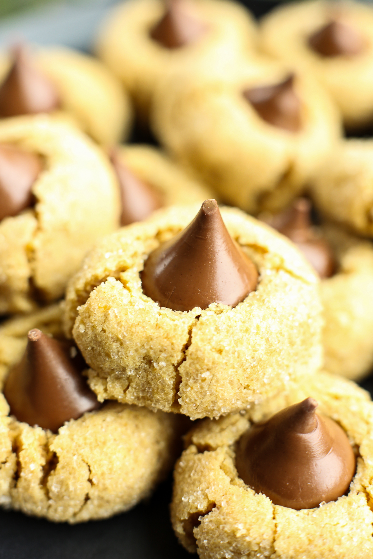 a stack of gluten free peanut butter blossoms
