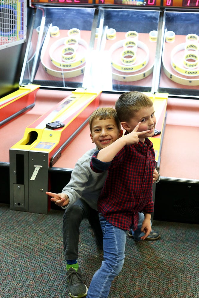 Luke's 6th Birthday Party at Chuck E Cheese's-posing with a friend