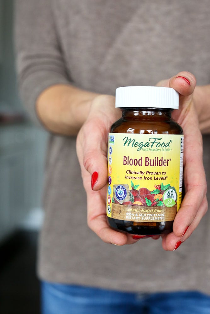 You Might Need an Iron Supplement Mega Food Blood Builder Iron Supplement-held in 2 hands