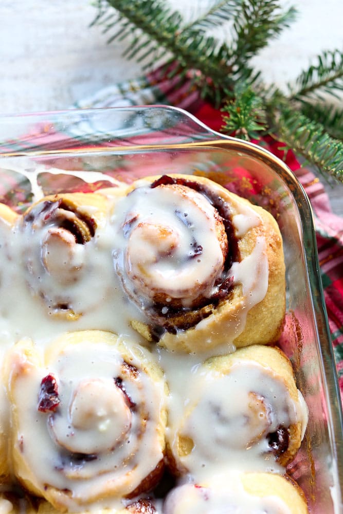 Overnight Cranberry Cinnamon Rolls-half of the pan with a Christmas napkin