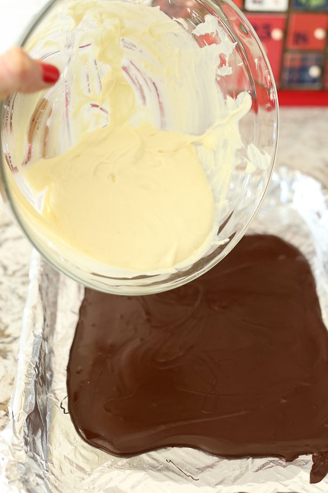 Homemade Peppermint Bark Recipe step by step instructions spreading the chocolate