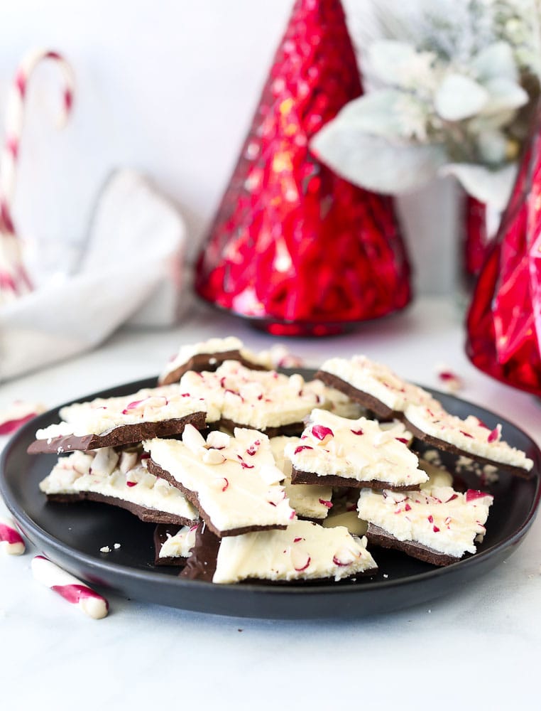 Homemade Peppermint Bark Recipe- on a plate with Christmas decorations