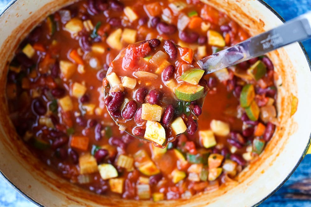 Minestrone Soup Recipe--in a big pot with a ladle serving it