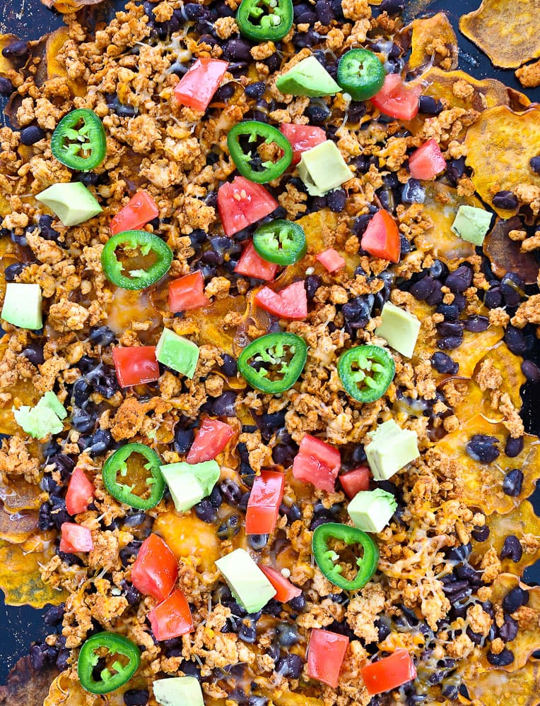 Sweet Potato Nachos Recipe on a sheet pan with lots of toppings