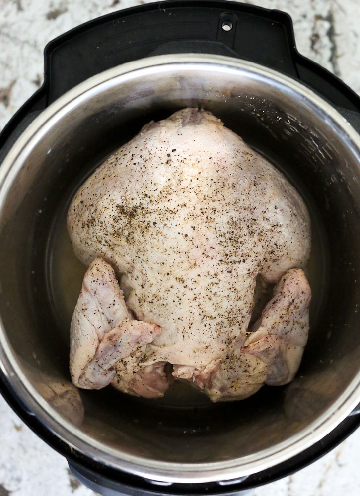 How to Cook a Whole Chicken in the Instant Pot the chicken in the pot before cooking