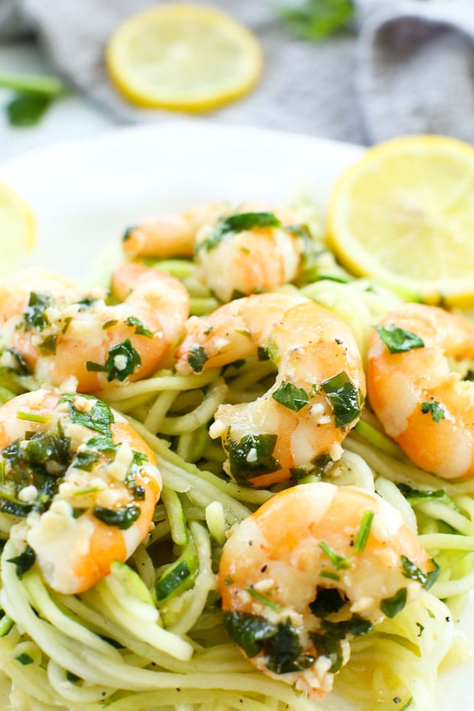 Shrimp Scampi recipe with zucchini noodles on a white plate