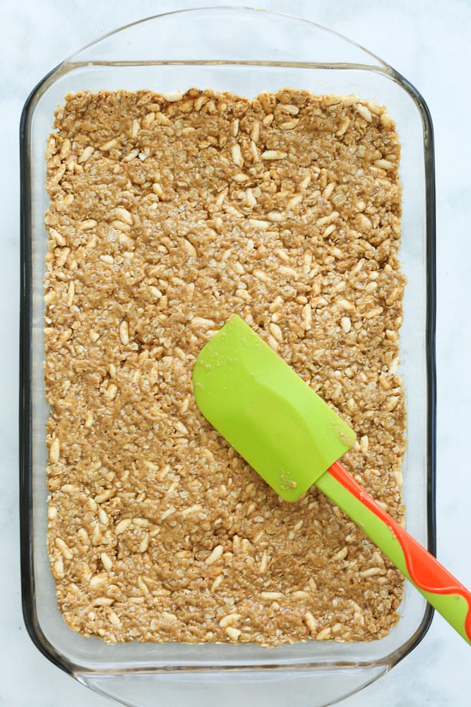 Chocolate Peanut Butter Cereal Bars pressing into pan no bake