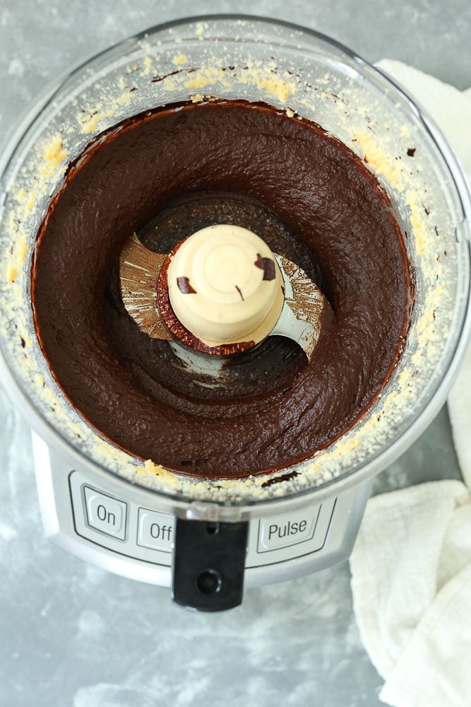 Brownie Batter Dessert Hummus adding the chocolate