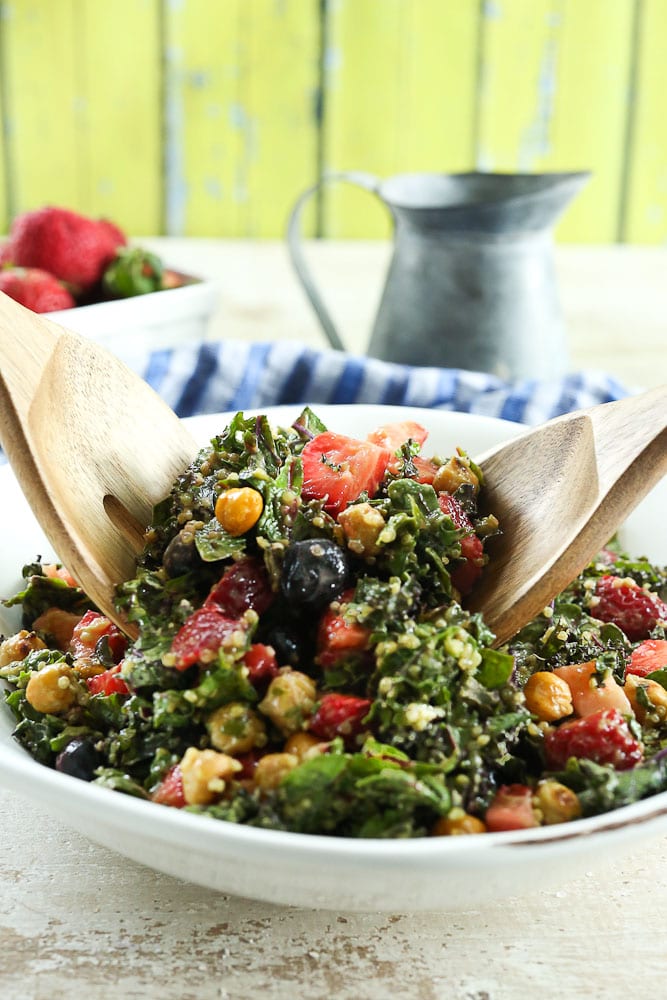 Massaged Kale Salad recipe #salad #healthy #vegan #glutenfree #healthyrecipes #saladrecipes #easyrecipes #summerrecipes #berries #blueberries #strawberries #quinoa #chickpeas