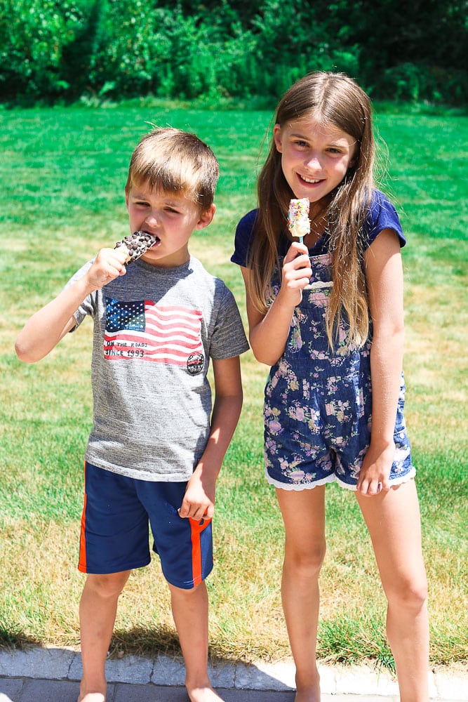 Greek Yogurt Frozen Banana Pops kids eating them