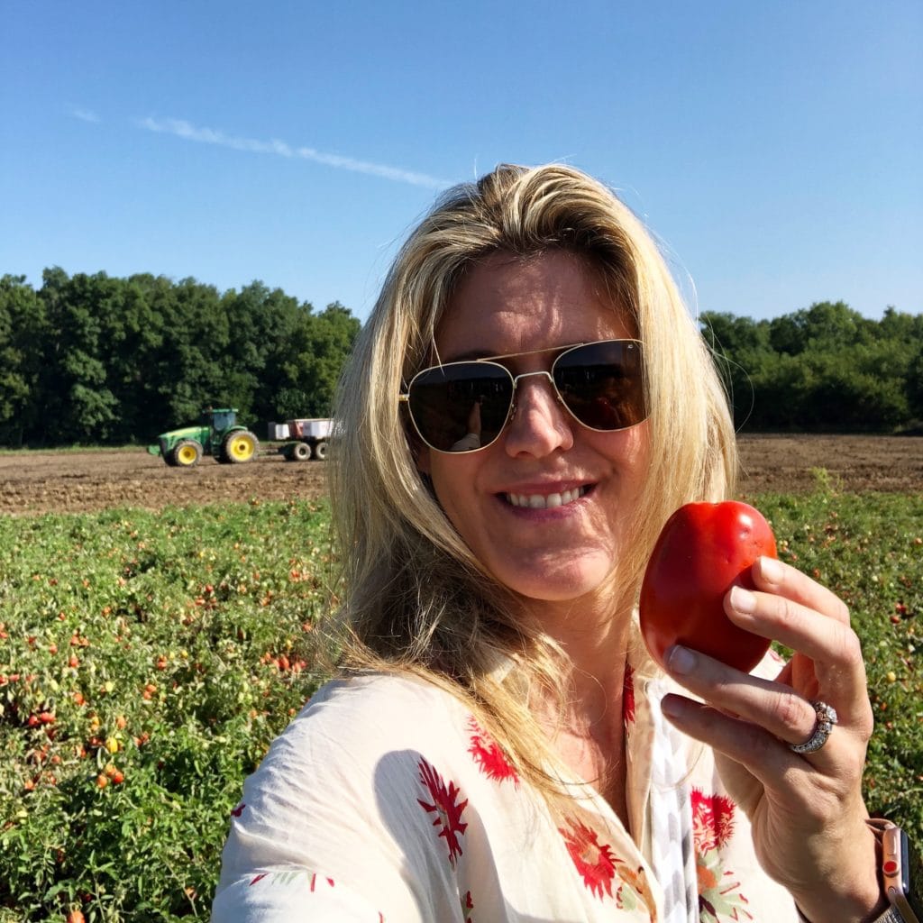 Are Canned Foods Nutritious? (holding a tomato at Triple s farm )