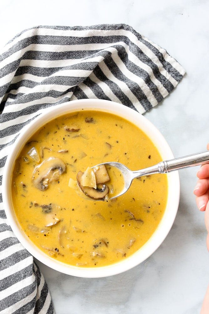 Quick and easy vegan mushroom soup with spoon