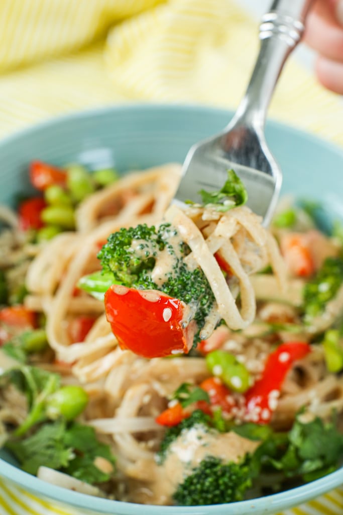 Vegetarian dinner recipes ideas== vegan asian noodle bowl close up shot with noodles on a fork 