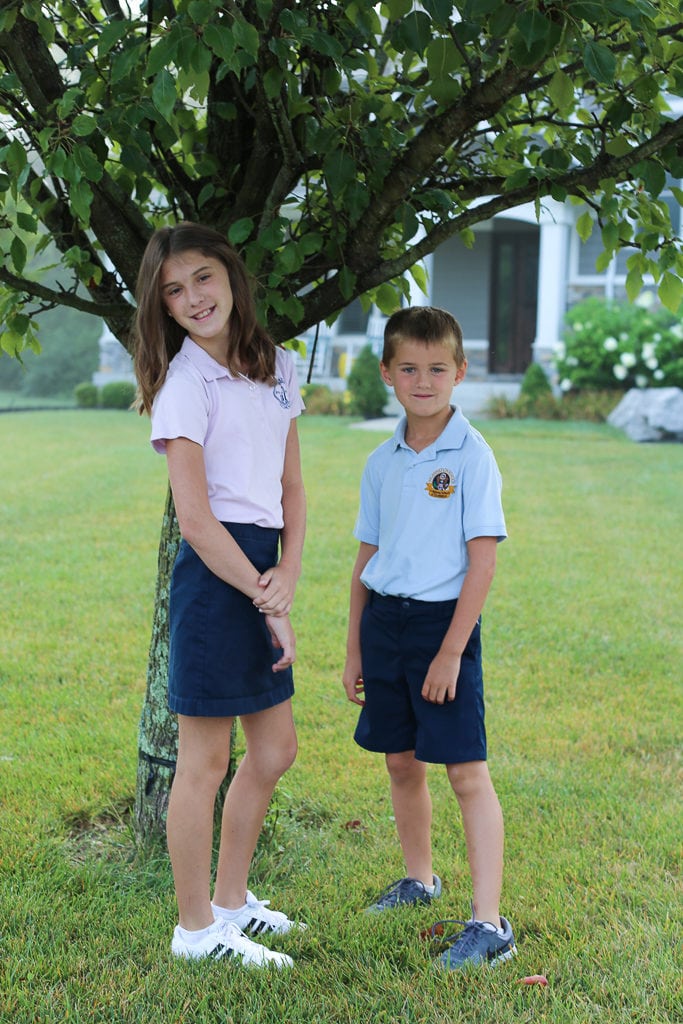Meghan and Luke first day of school 2019 in front of tree