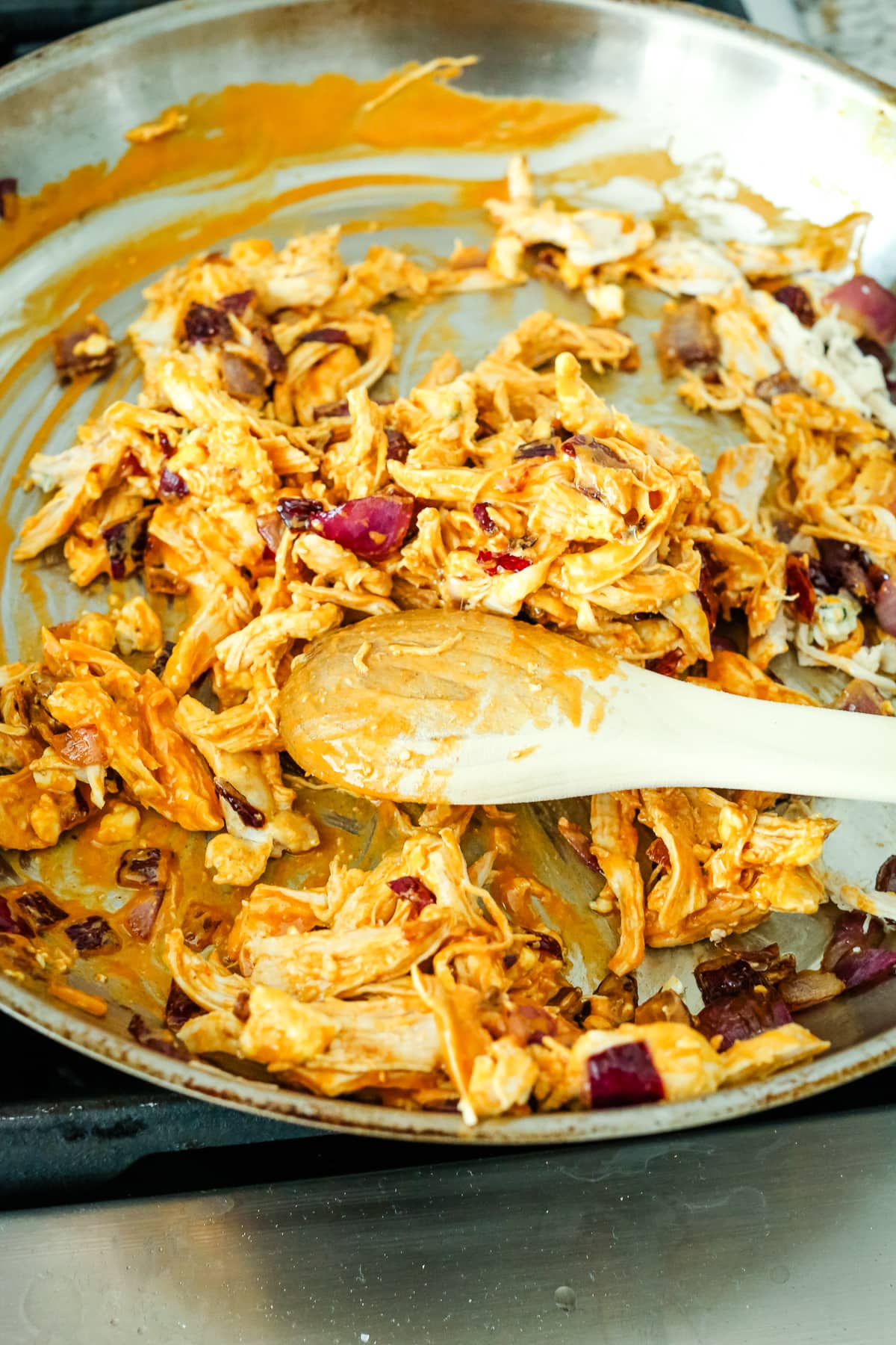 buffalo chicken mixture in a pan
