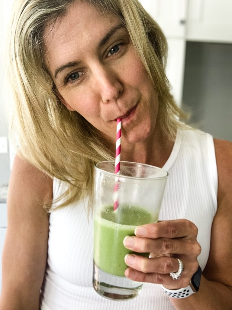 drinking from a non-plastic paper straw 