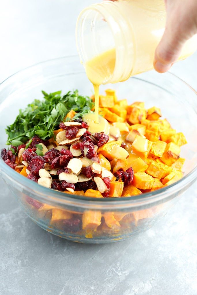 Roasted Sweet Potato Salad Recipe pouring dressing