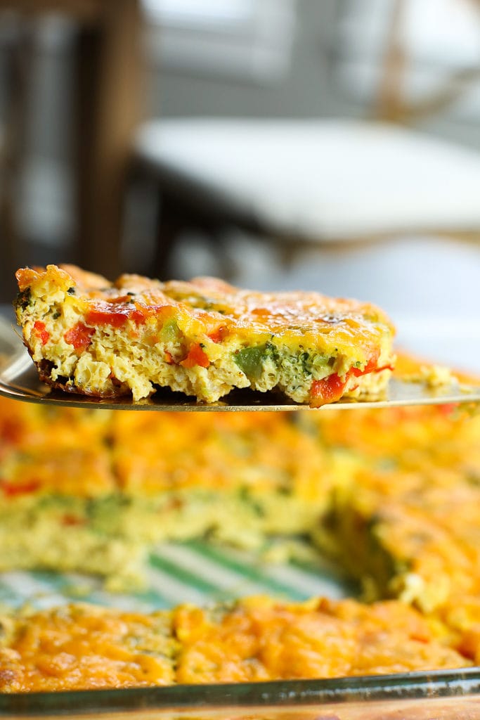 Easy Breakfast Egg Casserole recipe one slice on a spatula
