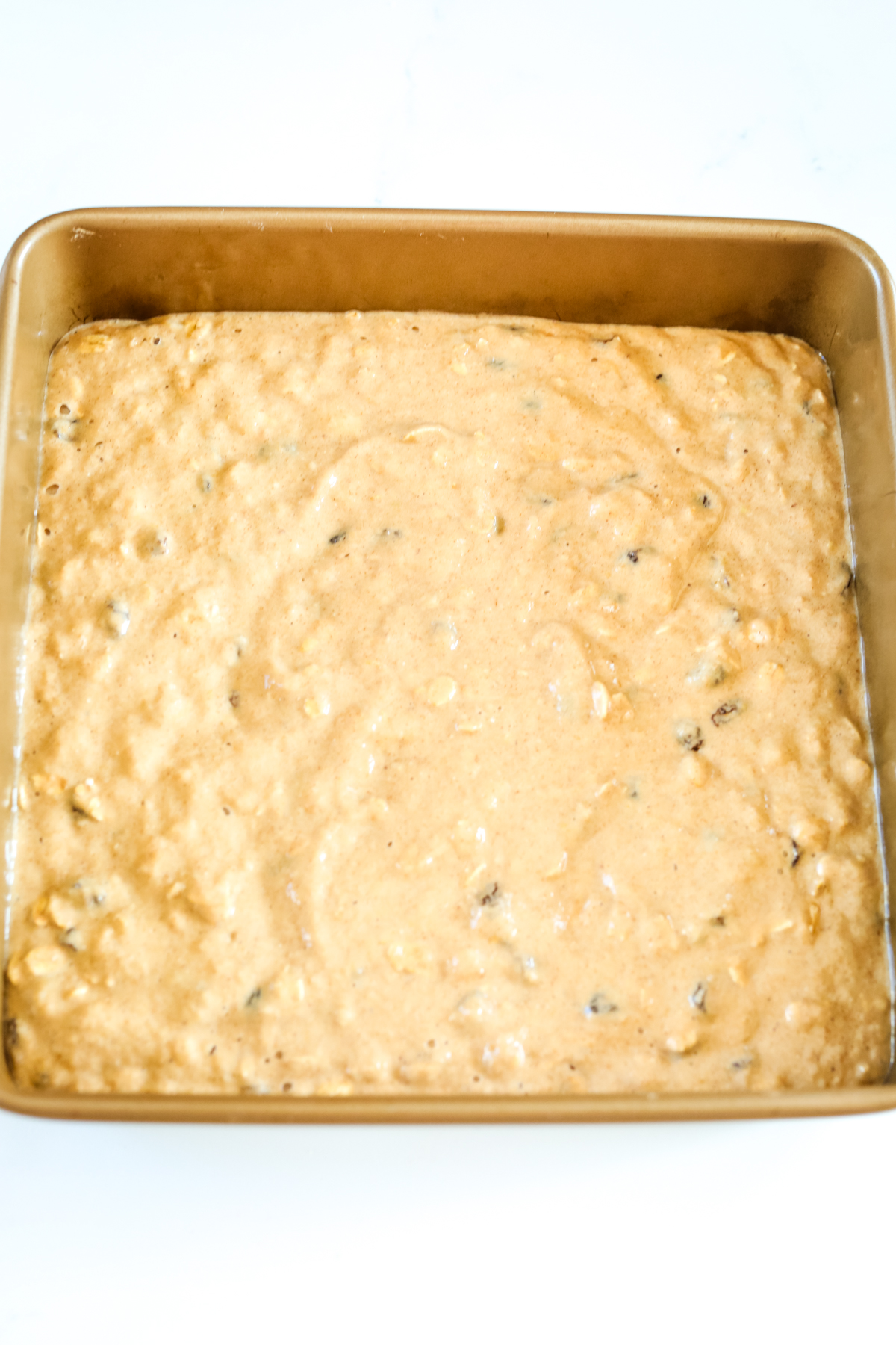 cake batter in a square pan not baked yet