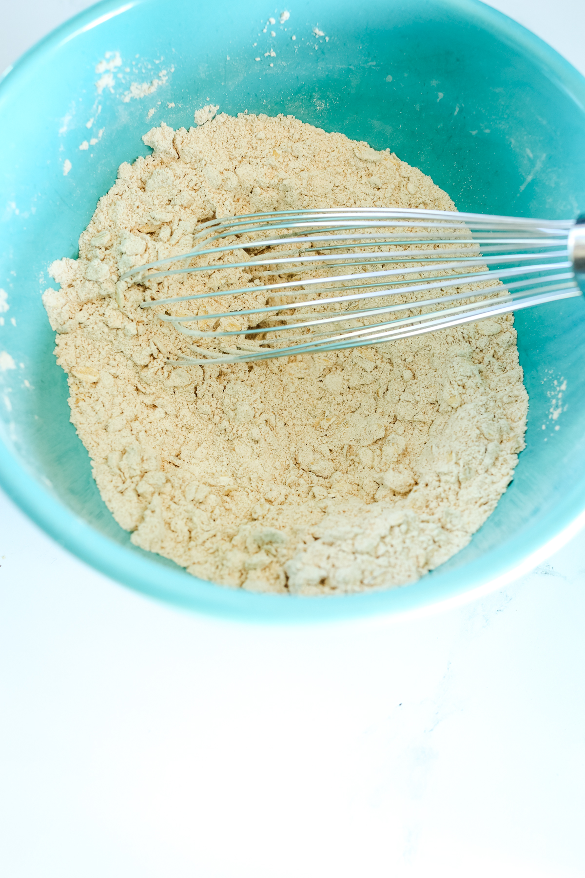 dry ingredients in a bowl with a whisk
