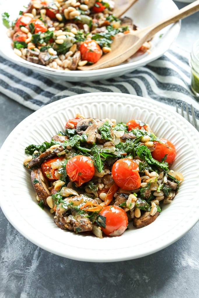 The final vegetable grain bowl in a white bowl