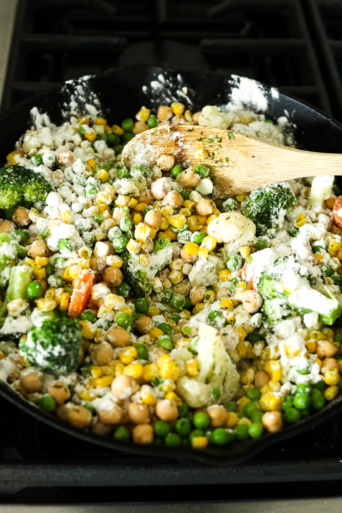 stirring flour into vegetables