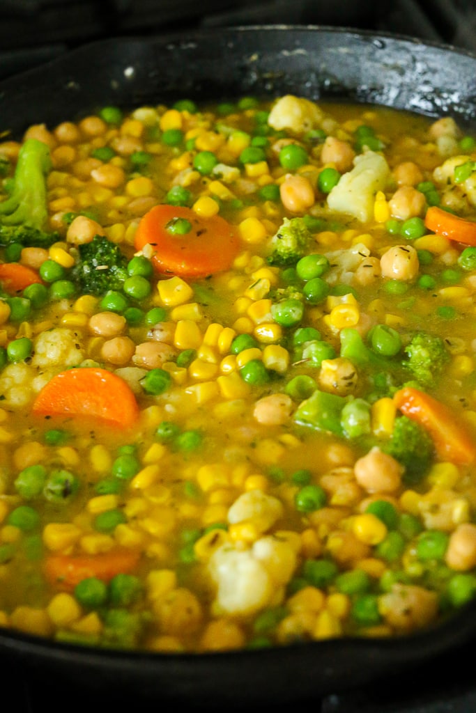vegetables simmering in a broth