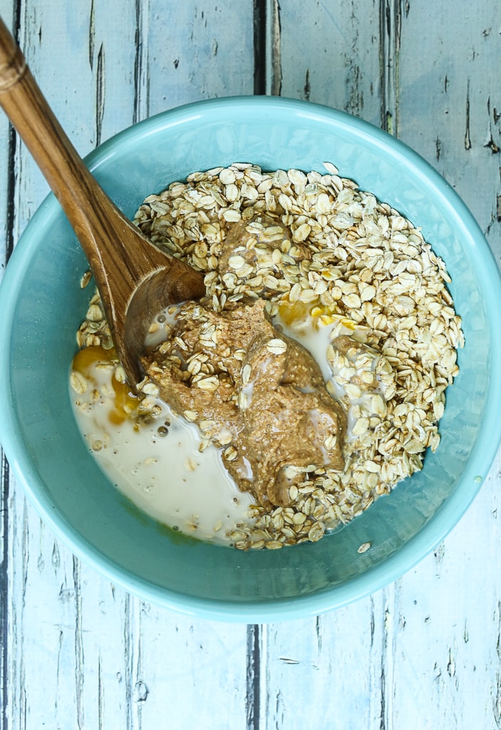 stirring together the ingredients in a bowl 