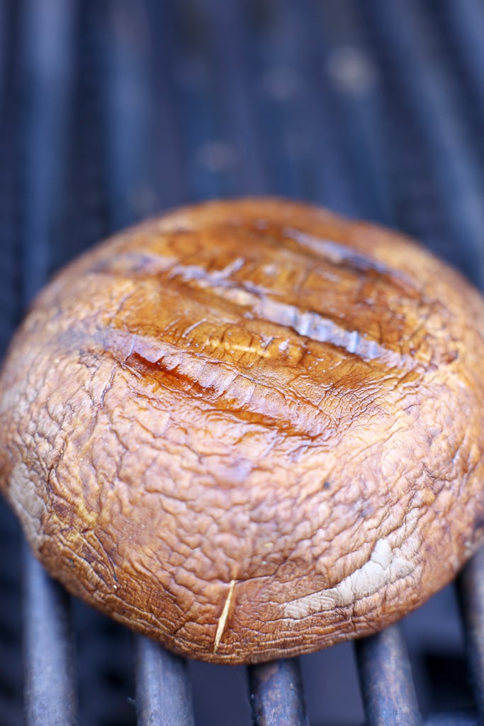 a grill with a portobello mushroom cap with grill marks