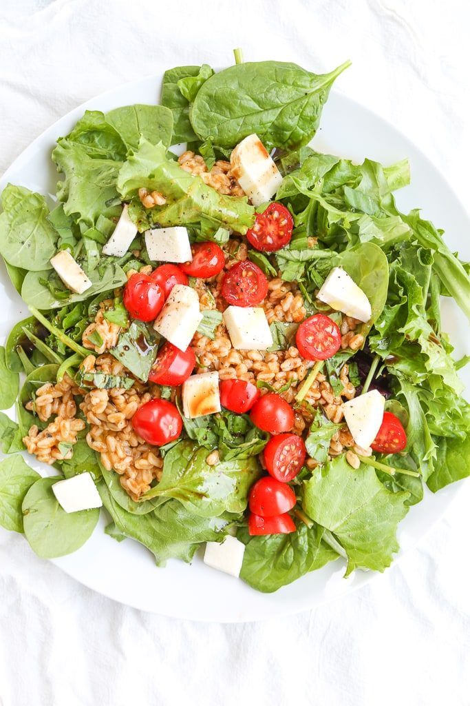an overhead shot of a salad with cooked farro
