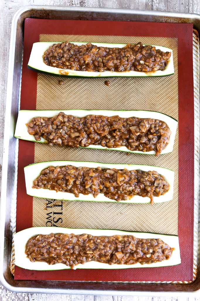 zucchini boats filled with lentil taco mixture