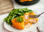Buffalo Chicken Breast recipe cut with a fork