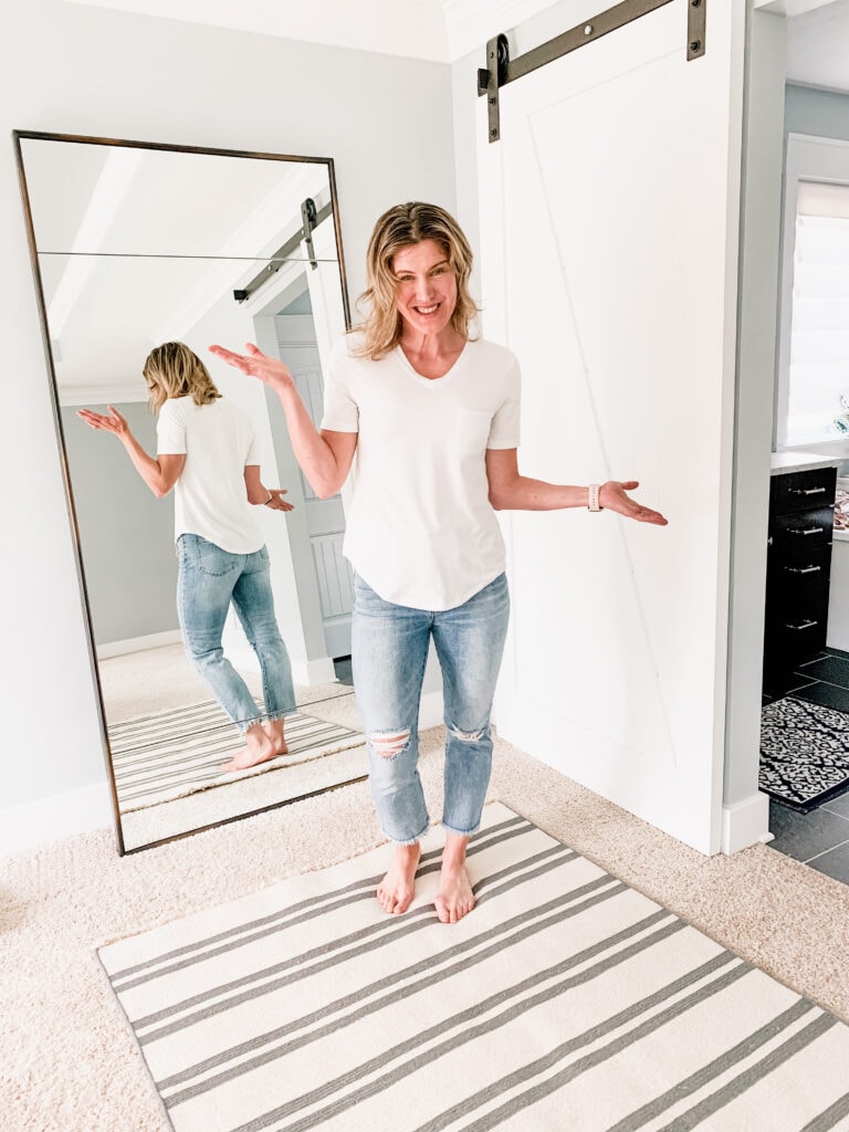 a woman in jeans and the perfect white tee