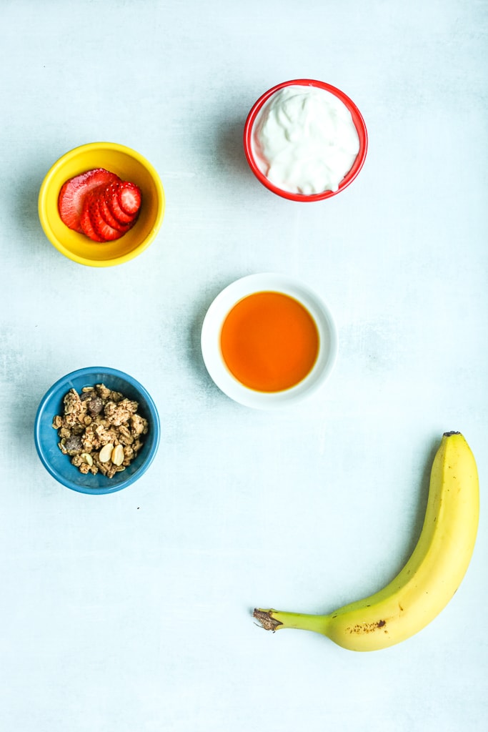 Ingredients for healthy banana split breakfast bowl