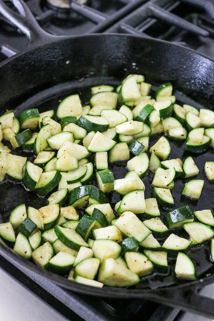 sauteing zucchini in a cast iron skillet