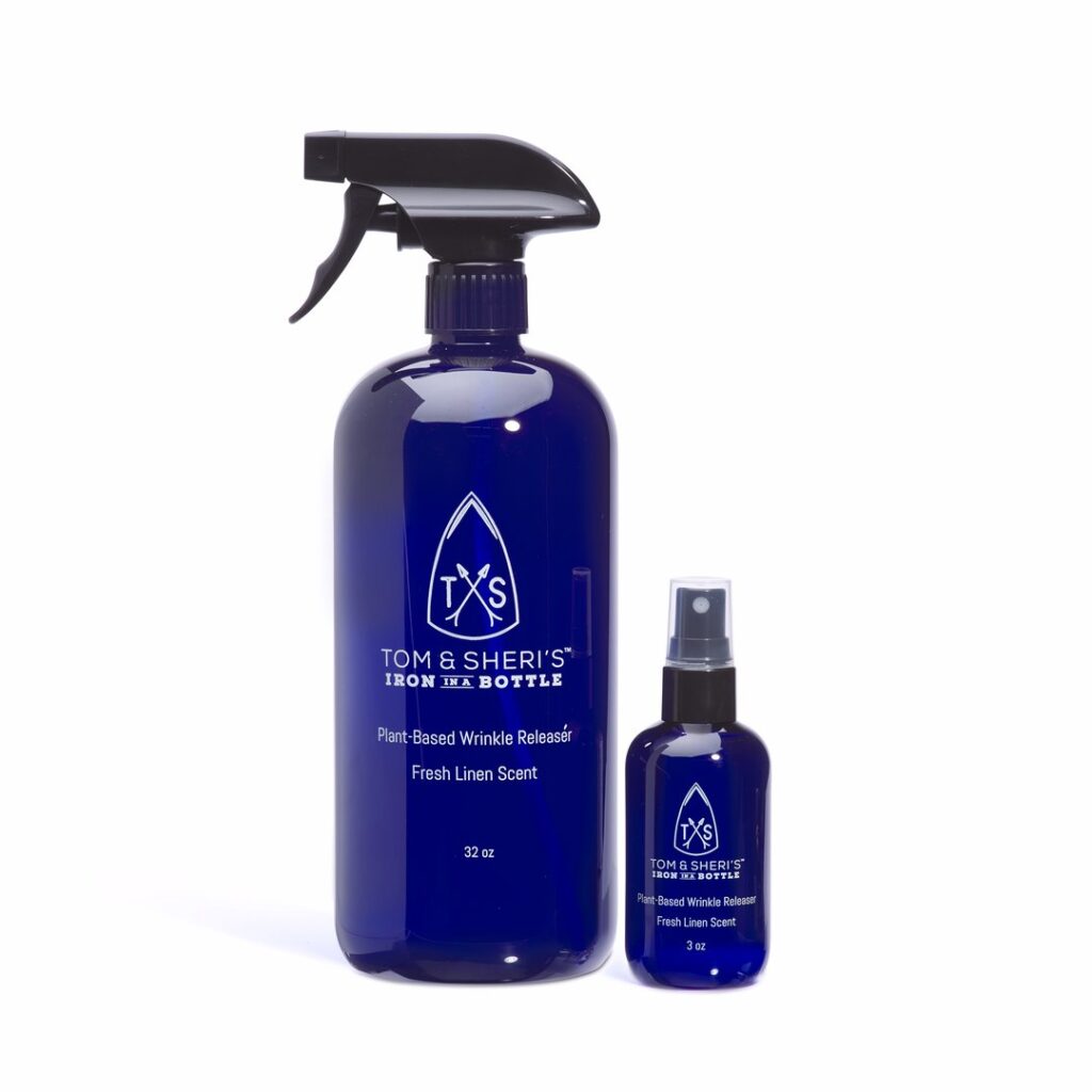 two blue bottles of Tom & Sheri's iron in a bottle