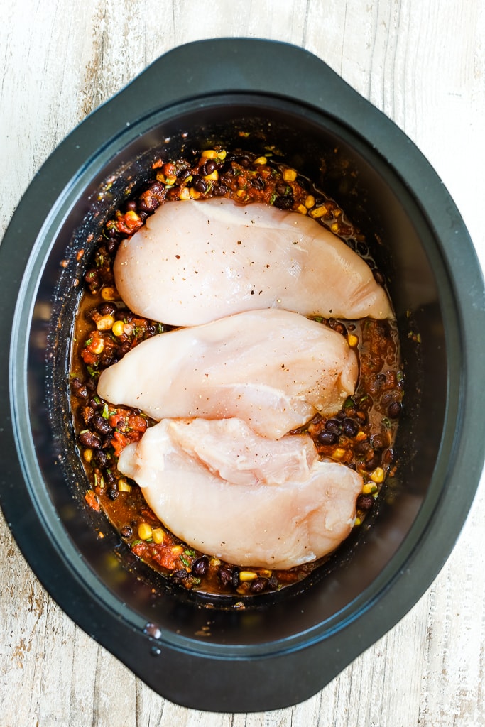 Crockpot Chicken Tacos Recipe ingredients in the slow cooker raw