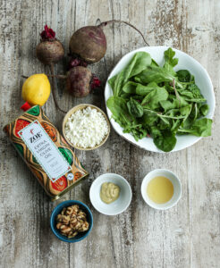 ingredients for Beet Salad with goat cheese recipe laid out on a board