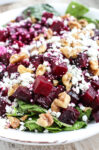 a close up photo of beet salad with goat cheese