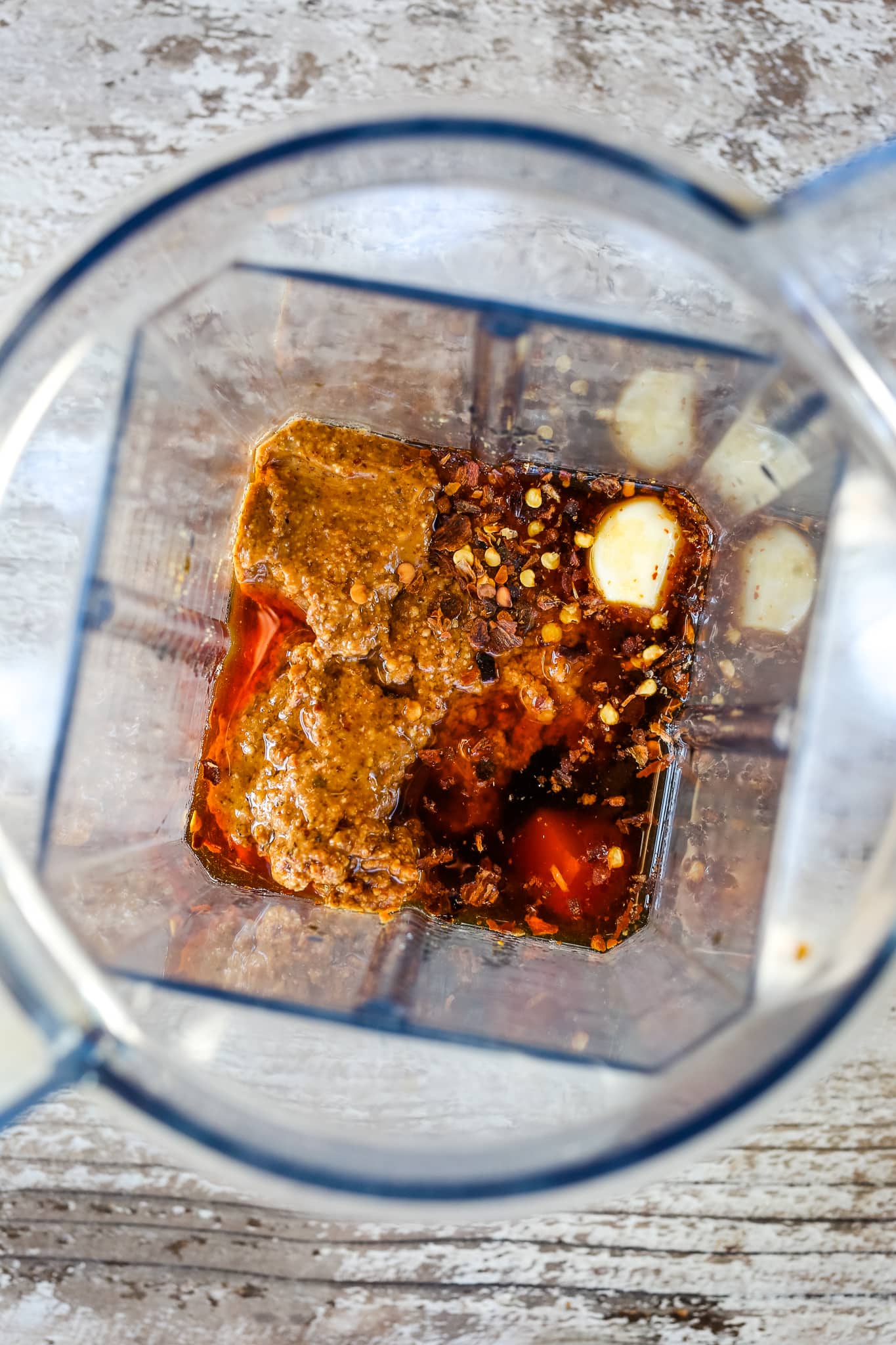 dressing ingredients in a blender, overhead view