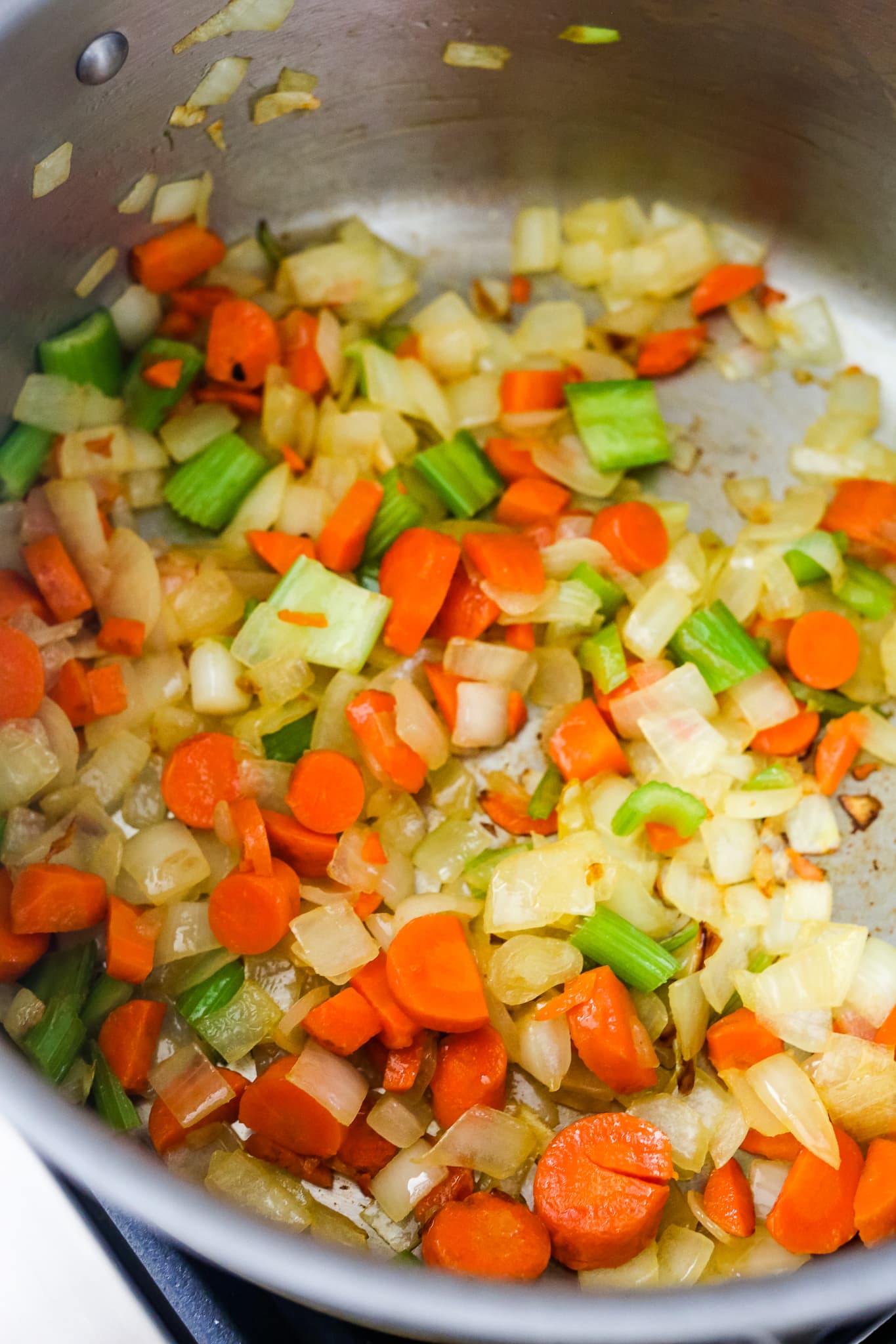 sauteing vegetables for roasted red pepper soup recipe