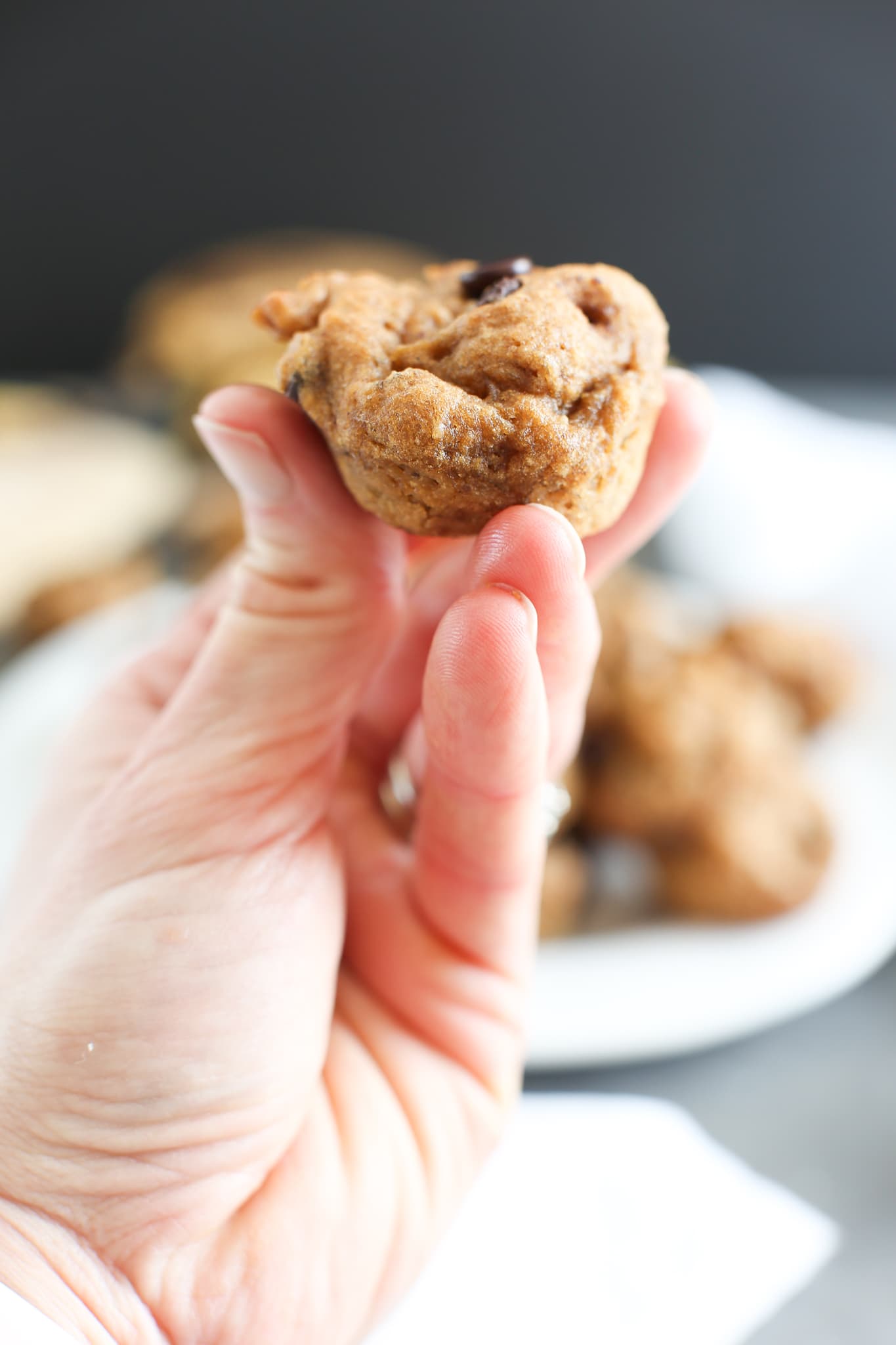 a mini muffin help up in a hand