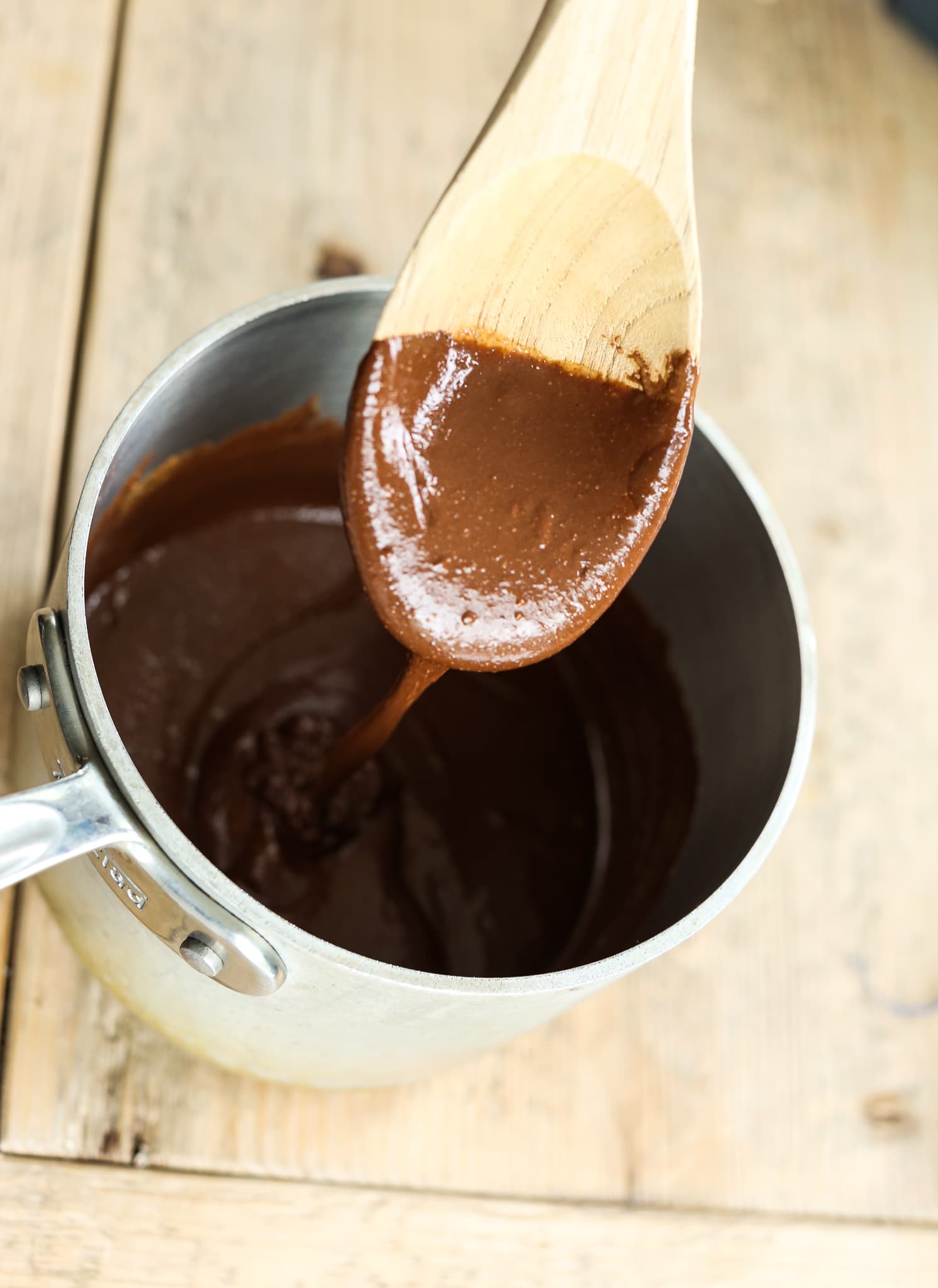 chocolate mixture dripping from a wooden spoon