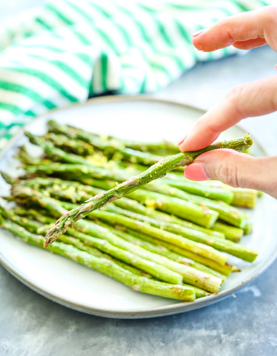 eating Air Fryer Asparagus Recipe with my hands