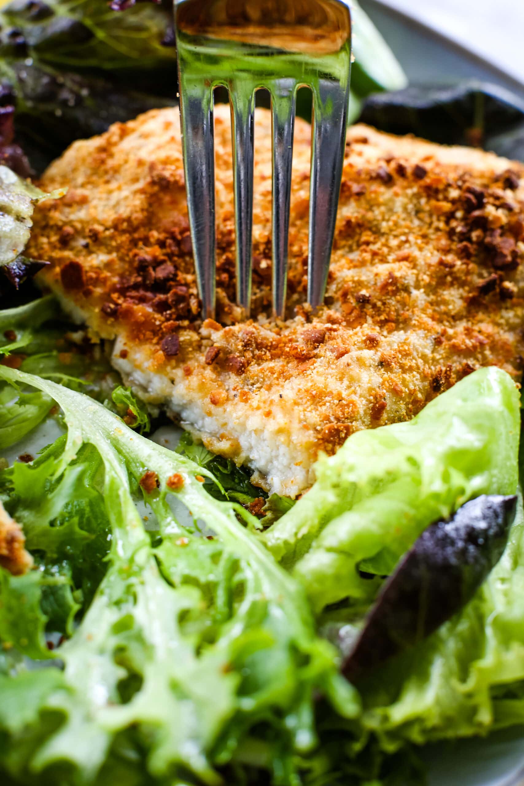 air fryer chicken cutlets with a fork